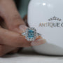 Radiant cut blue topaz proposal engagement ring