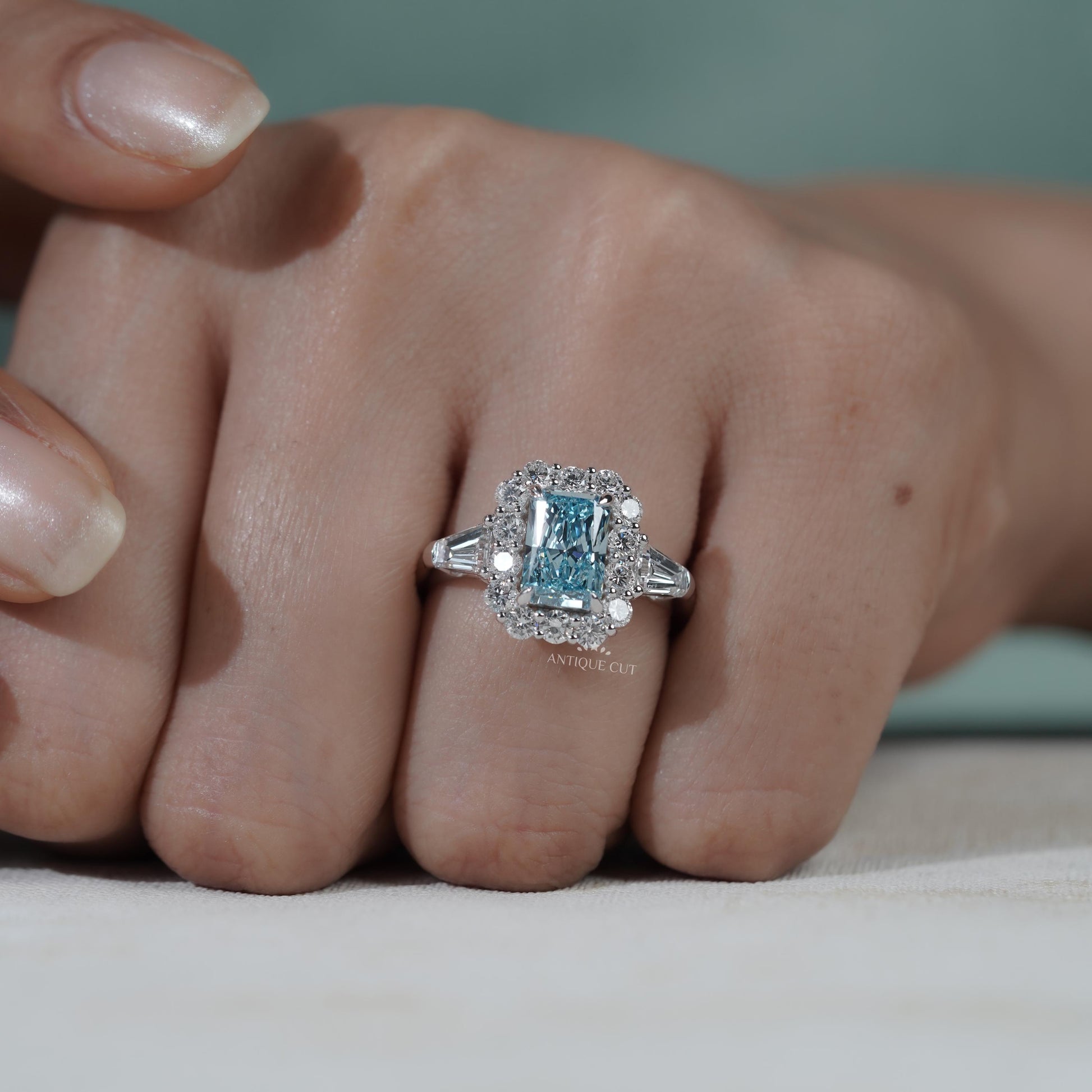 Elegant blue topaz radiant cut engagement ring