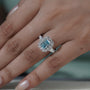 Halo setting radiant cut blue topaz ring
