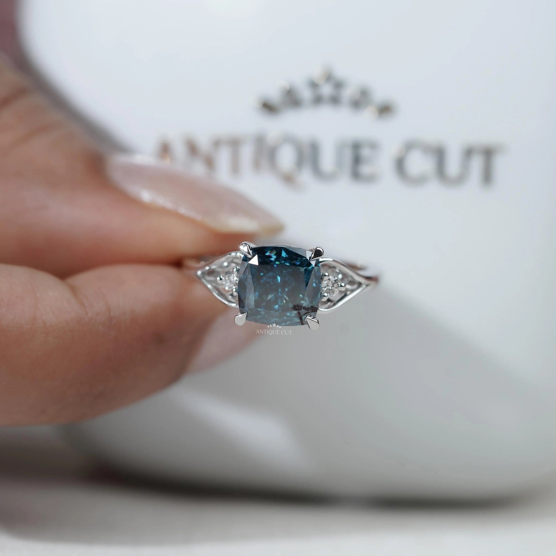 Luxury cushion cut blue diamond engagement ring in white gold
