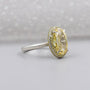 Yellow oval diamond halo ring with double halo setting