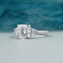 IGI certified cushion cut engagement ring in white gold with tapered baguette accents.