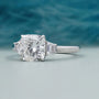 Lab grown cushion diamond bridal ring with tapered baguette accents