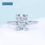 Cushion cut hidden halo engagement ring with solitaire diamond setting
