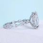 Oval lab grown diamond ring with marquise side stone accents
