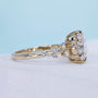 Round diamond engagement ring featuring round cut side stones
