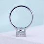 Hidden halo pear engagement ring with secure V prong setting
