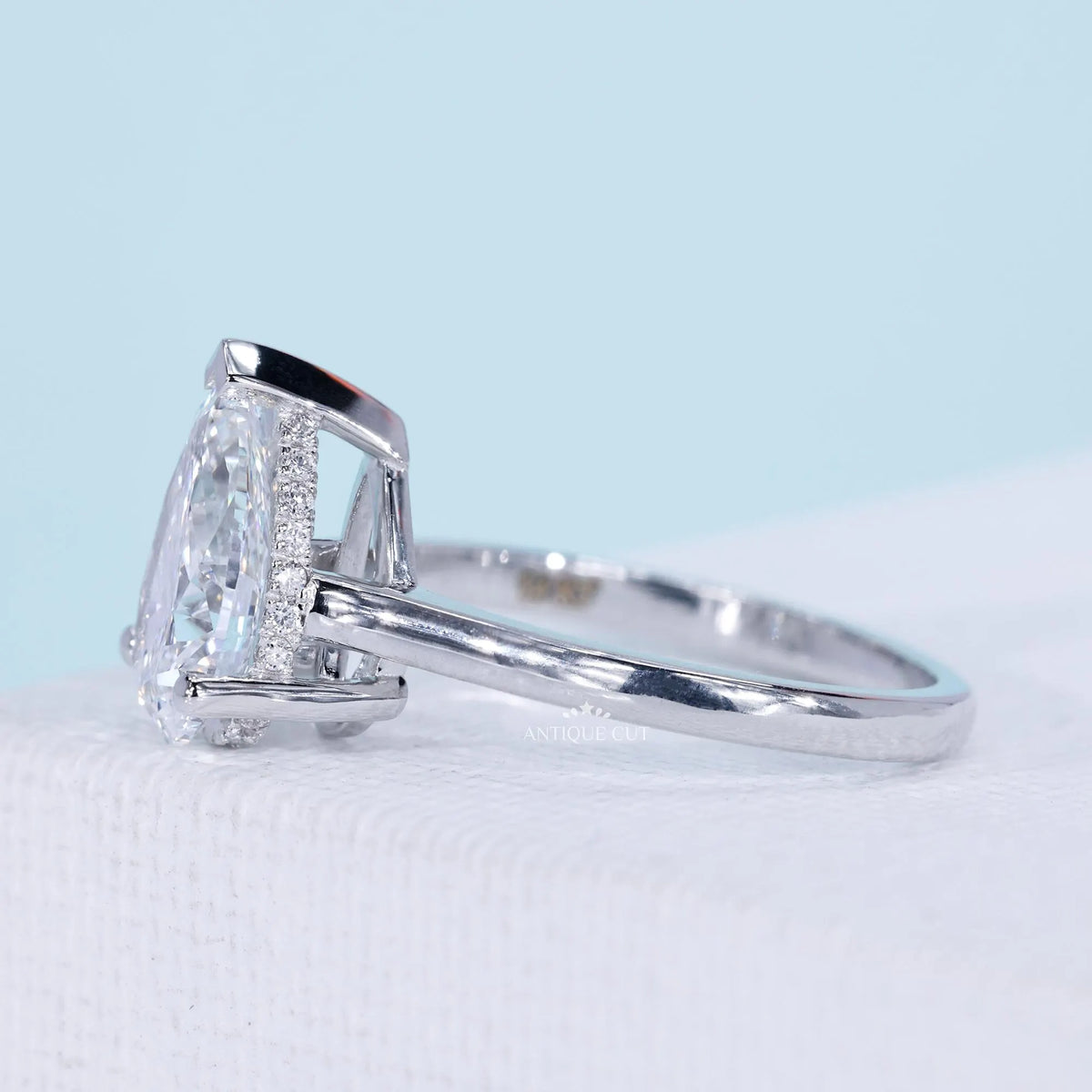 White gold pear cut solitaire engagement ring with lab grown diamond
