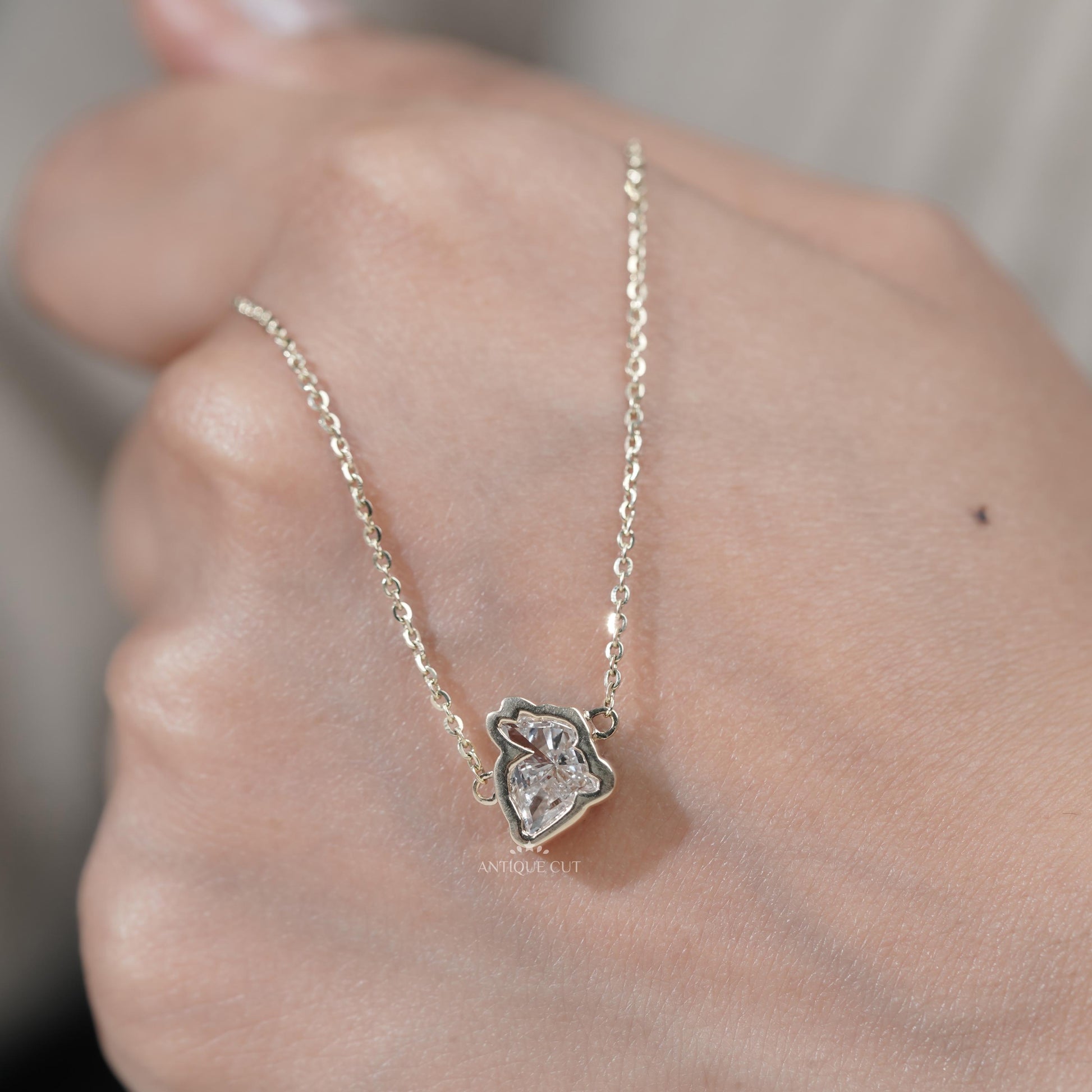 Minimal animal inspired diamond pendant