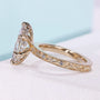 IGI certified marquise diamond engagement ring with milgrain details
