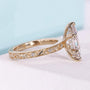Marquise cut diamond ring featuring hidden halo vintage design
