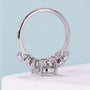 Oval cut diamond ring with elegant marquise side stone details
