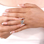 Pear diamond toi et moi engagement ring with secure claw prongs