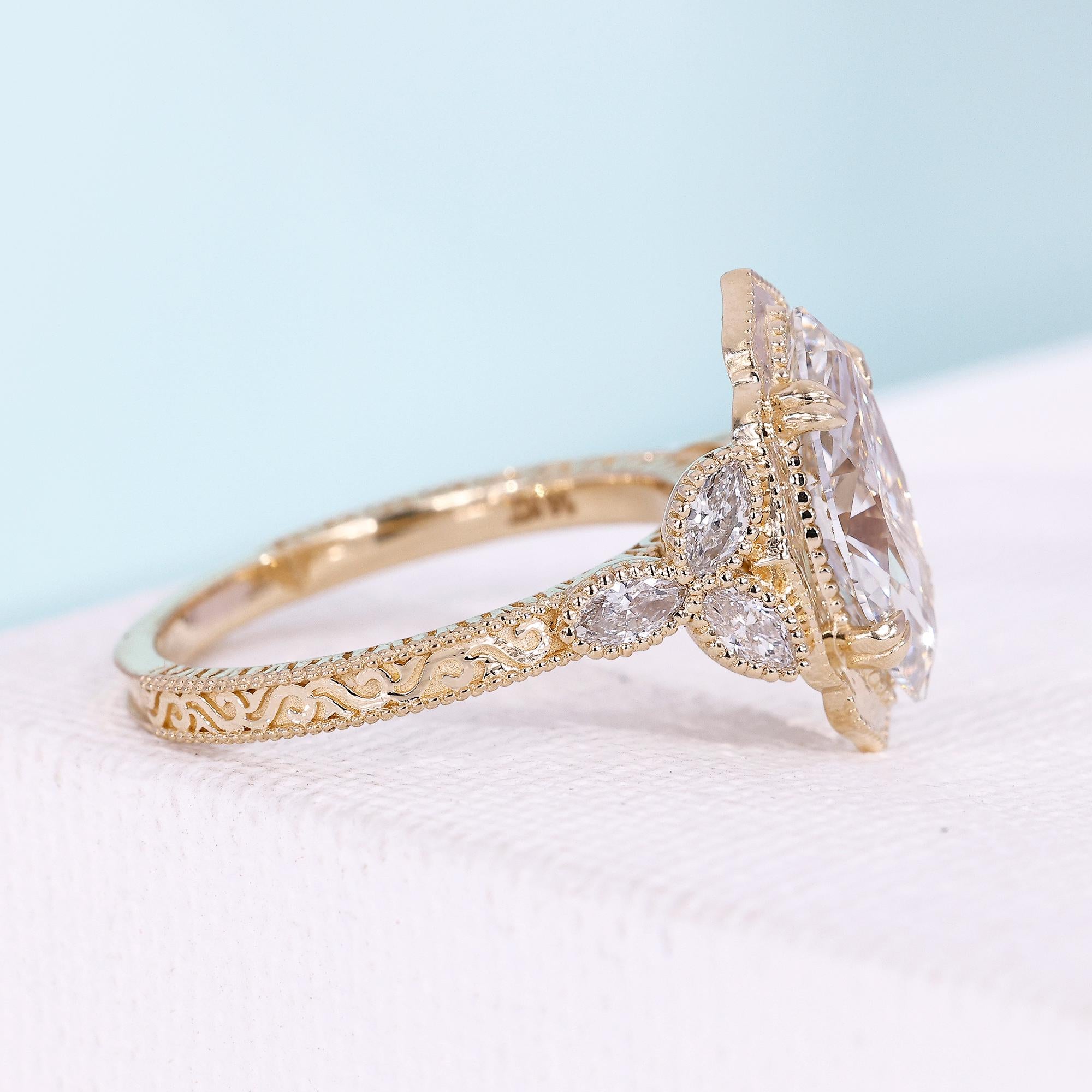 Seven stone marquise diamond ring with milgrain setting
