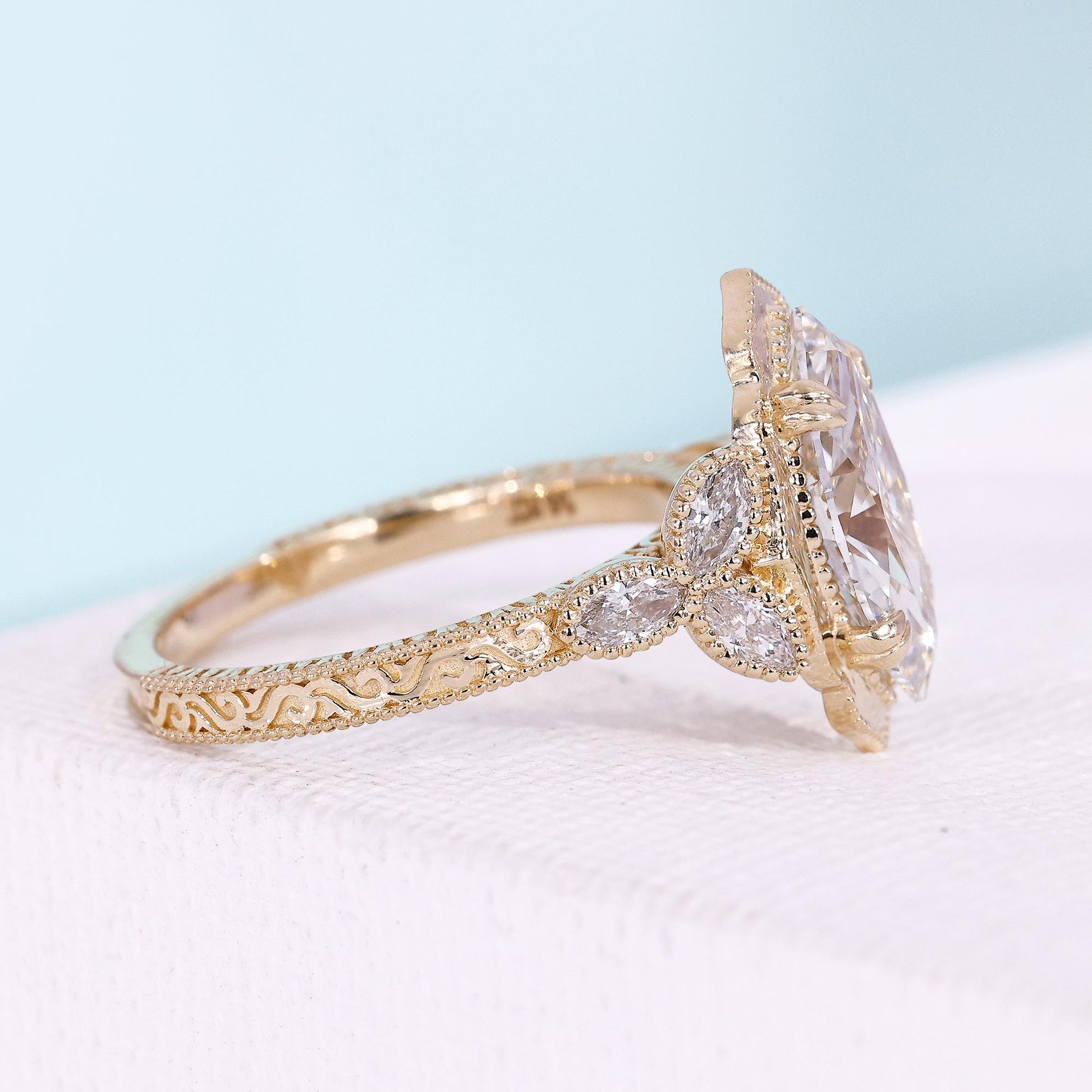 Seven stone marquise diamond ring with milgrain setting
