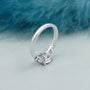 Elegant round solitaire diamond ring with leaf accents
