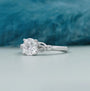 White gold round diamond ring with botanical leaf details