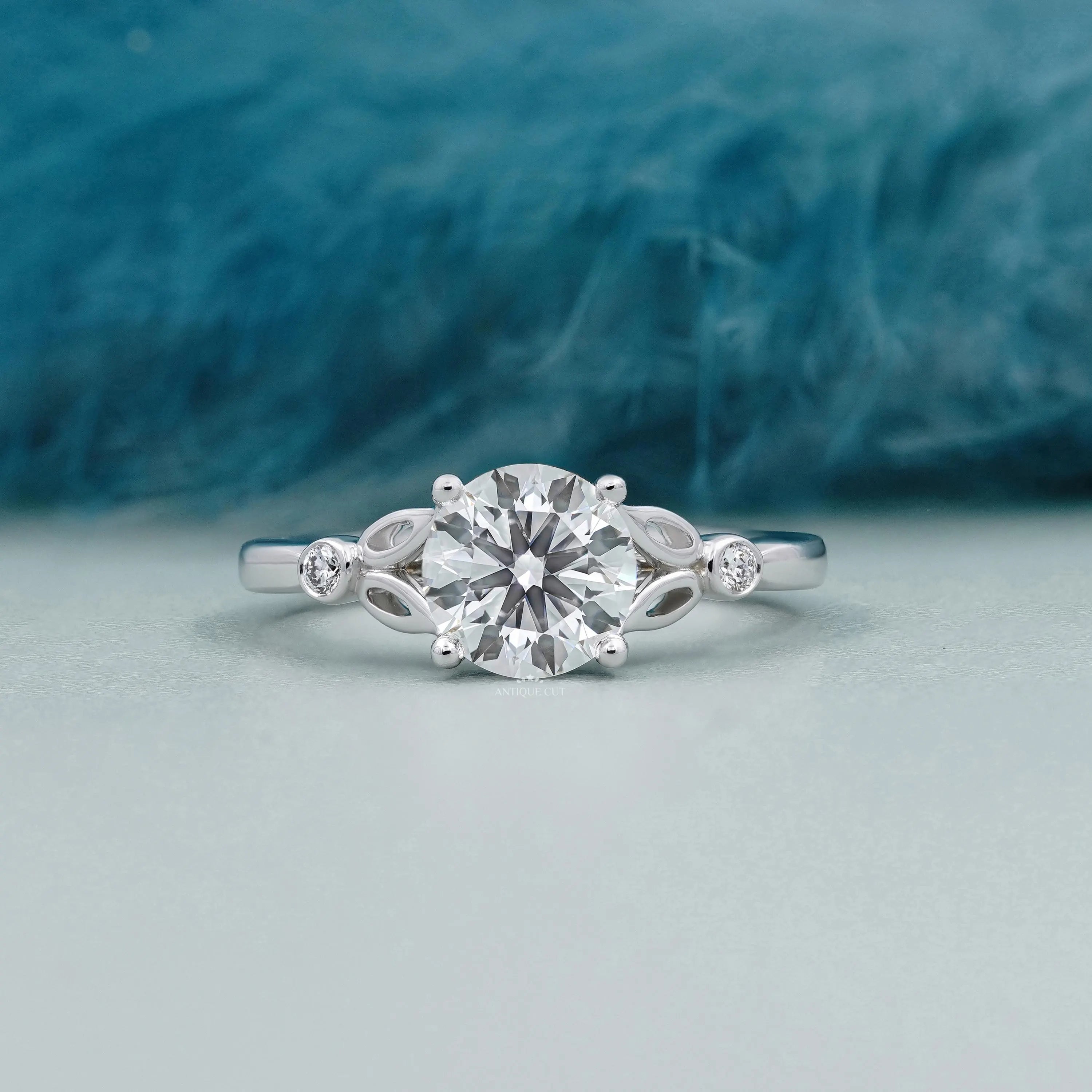Round Cut Diamond Engagement Ring with Leaf Side Accents in White Gold IGI Certified