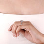 Hidden halo diamond ring with pavé set band
