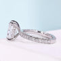 Three row pavé engagement ring with radiant center stone
