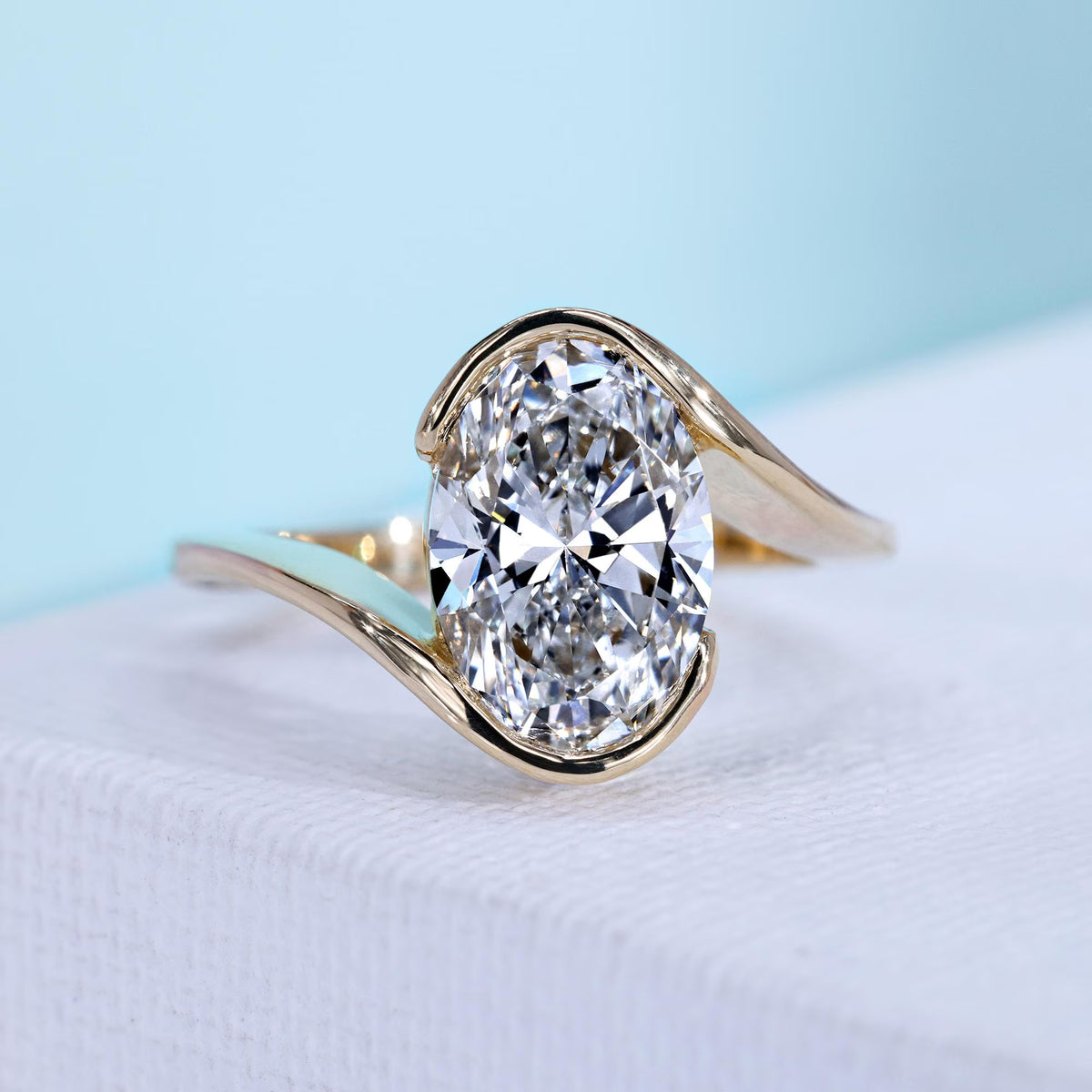 Oval Cut Diamond Bypass Engagement Ring Yellow Gold With Round Diamond Side Stone IGI Certified