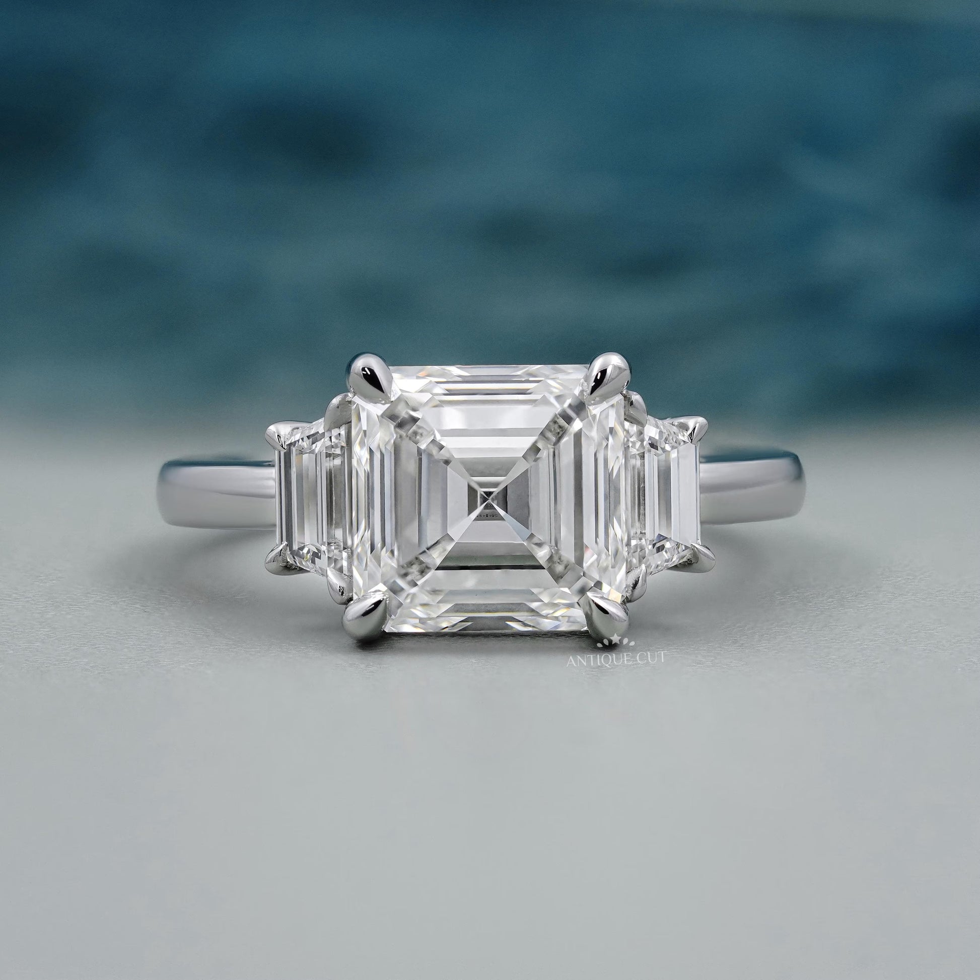 Three Stone Square Emerald Diamond Ring With Tapered Step Cut Side Stones Minimalist Bridal Jewelry