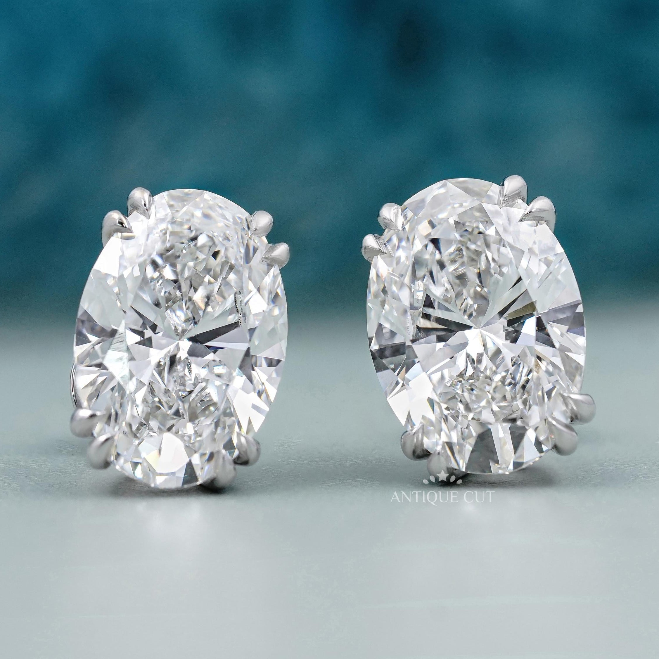 Side profile of white gold oval stud earrings