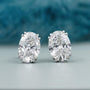 Side profile of white gold oval stud earrings