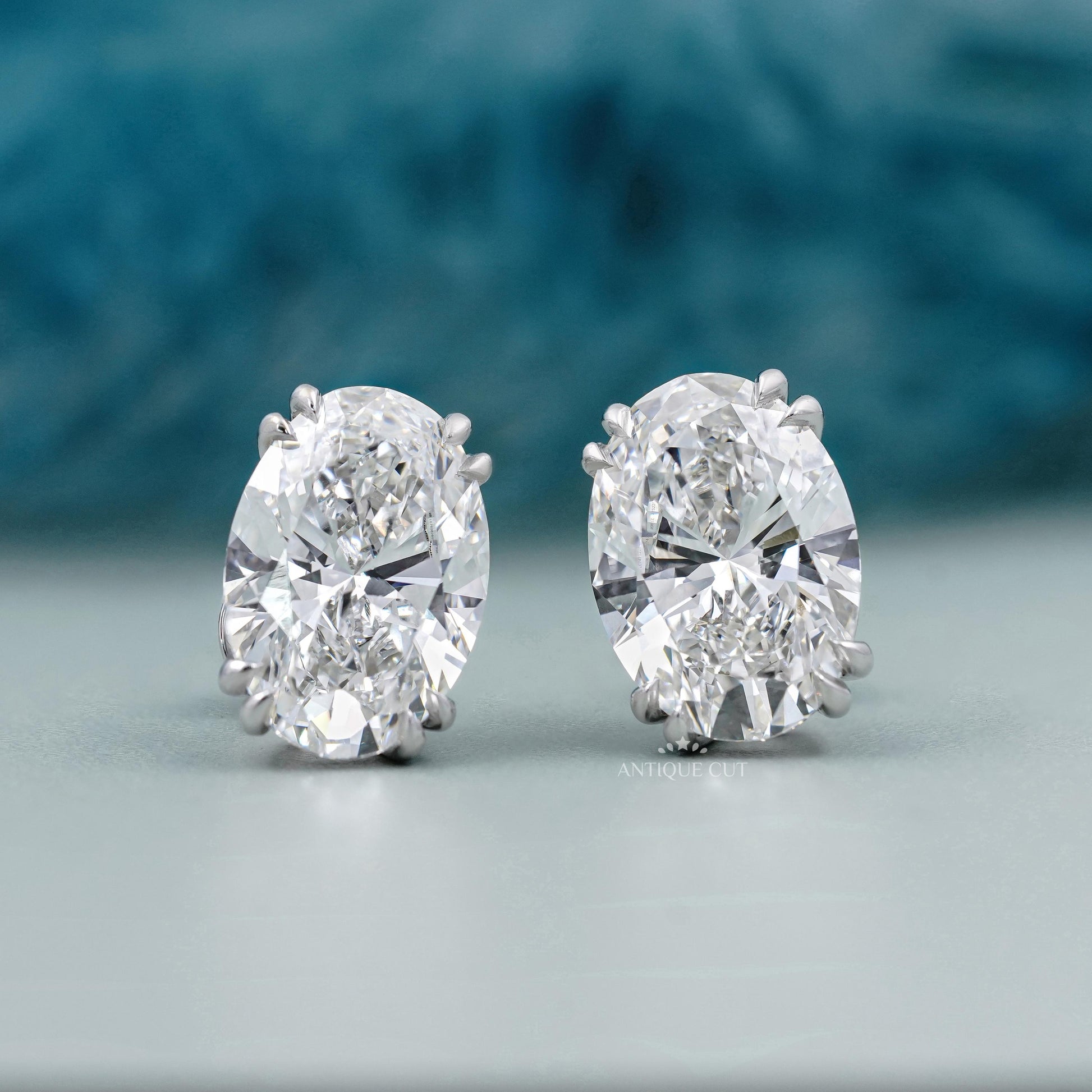 Side profile of white gold oval stud earrings