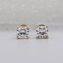 Yellow gold cushion cut diamond earrings with 4 prong setting
