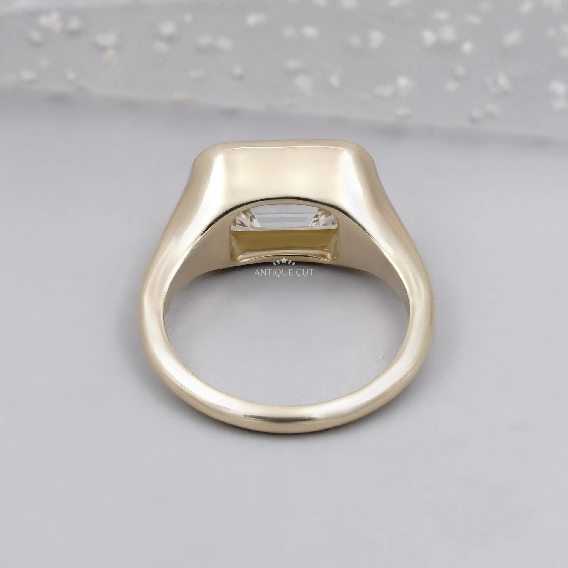 IGI Certified emerald cut diamond signet ring