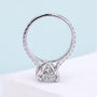 Oval cut diamond ring with elegant marquise side stone details
