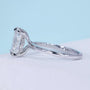 Women’s cushion cut engagement ring with secure claw prong setting
