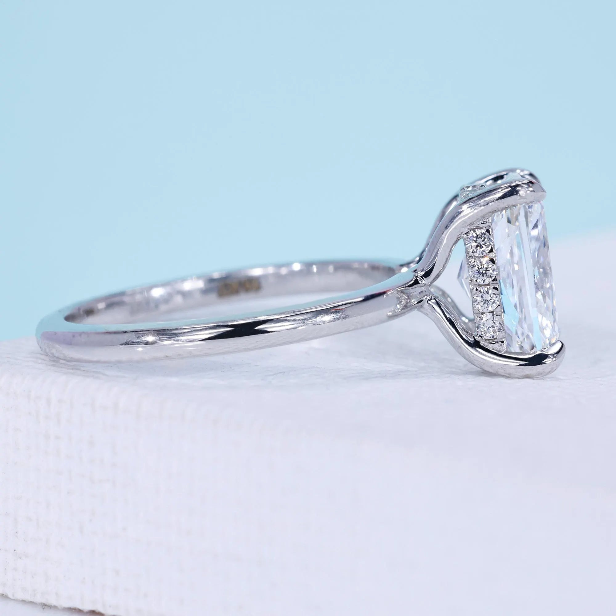 IGI certified cushion cut solitaire engagement ring with hidden halo
