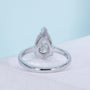 Antiquecut pear diamond engagement ring with solitaire design
