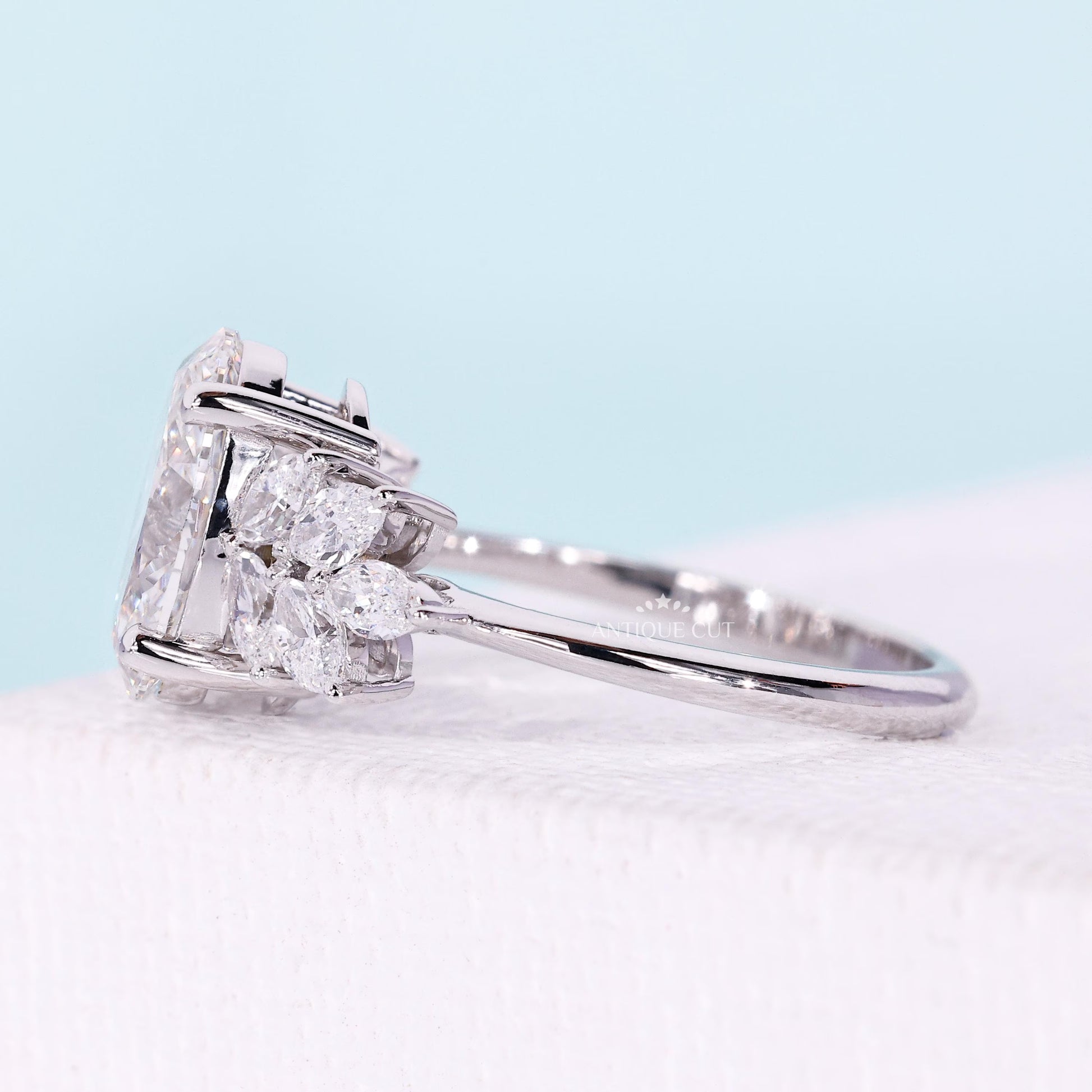 IGI certified oval cut diamond engagement ring with unique side accents

