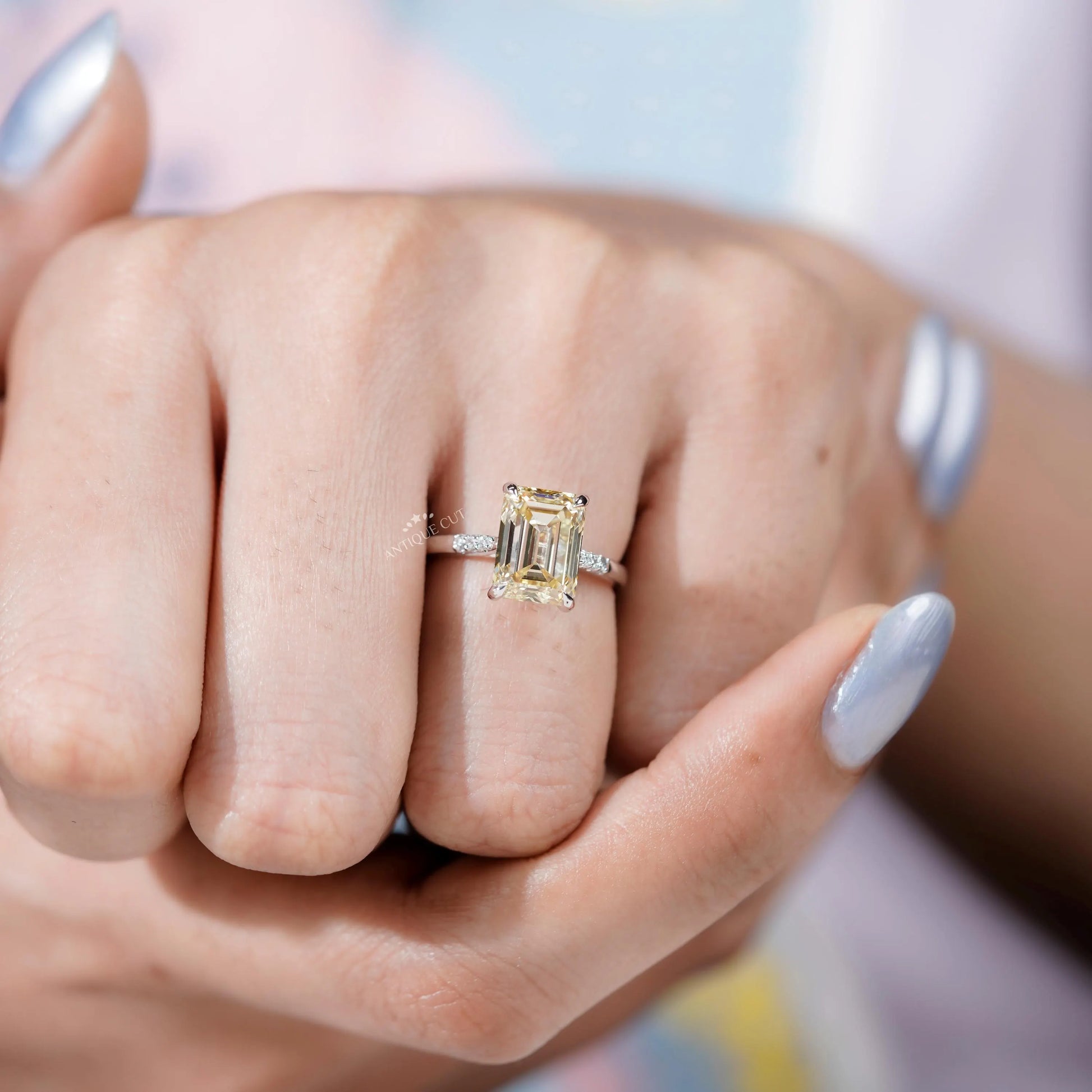 Luxury white gold Yellow Emerald Cut Diamond engagement ring.