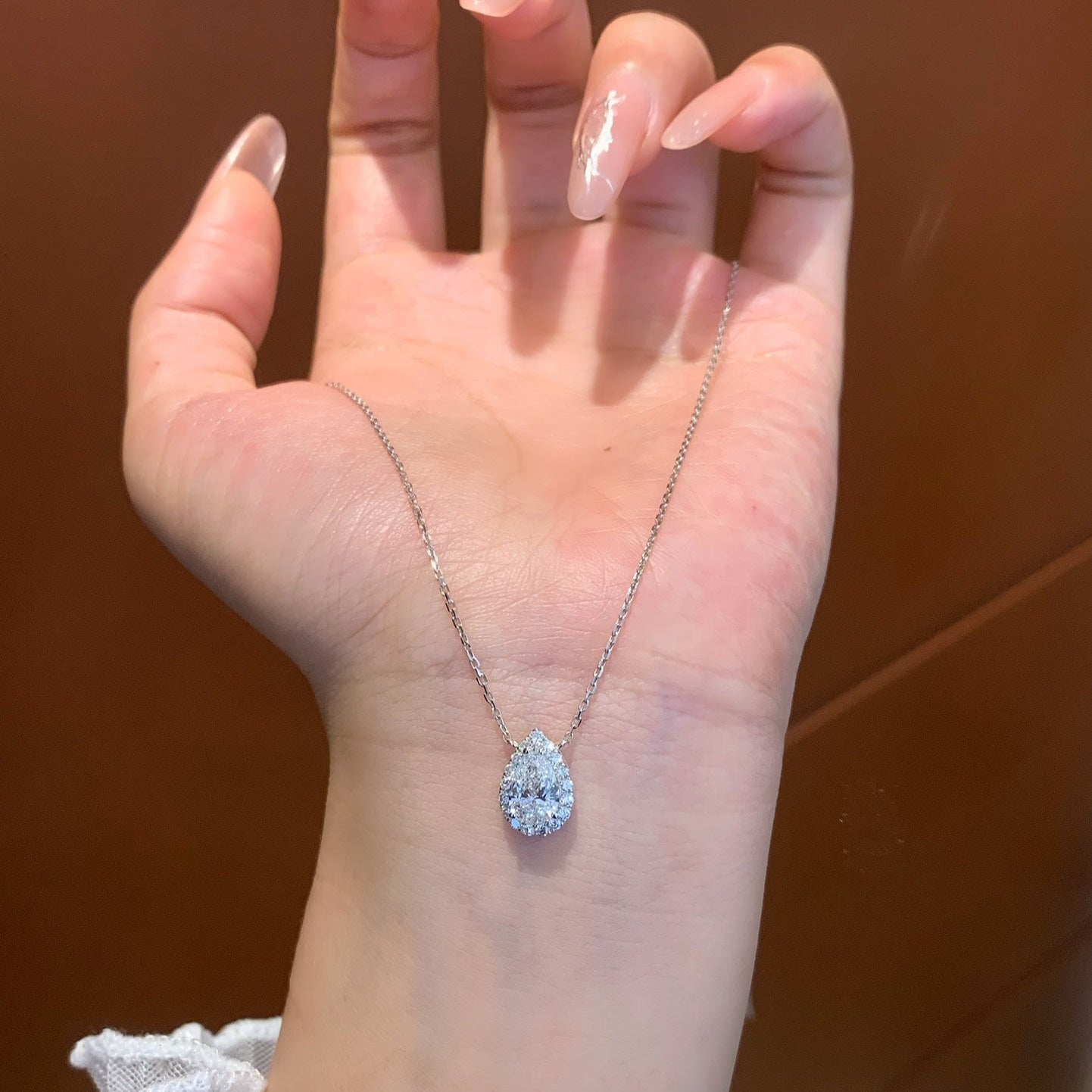 Pear 0.85tcw Lab Grown Diamond Halo Style Necklace, D-E-F Color, VVS-VS Clarity - IGI Certified Necklace