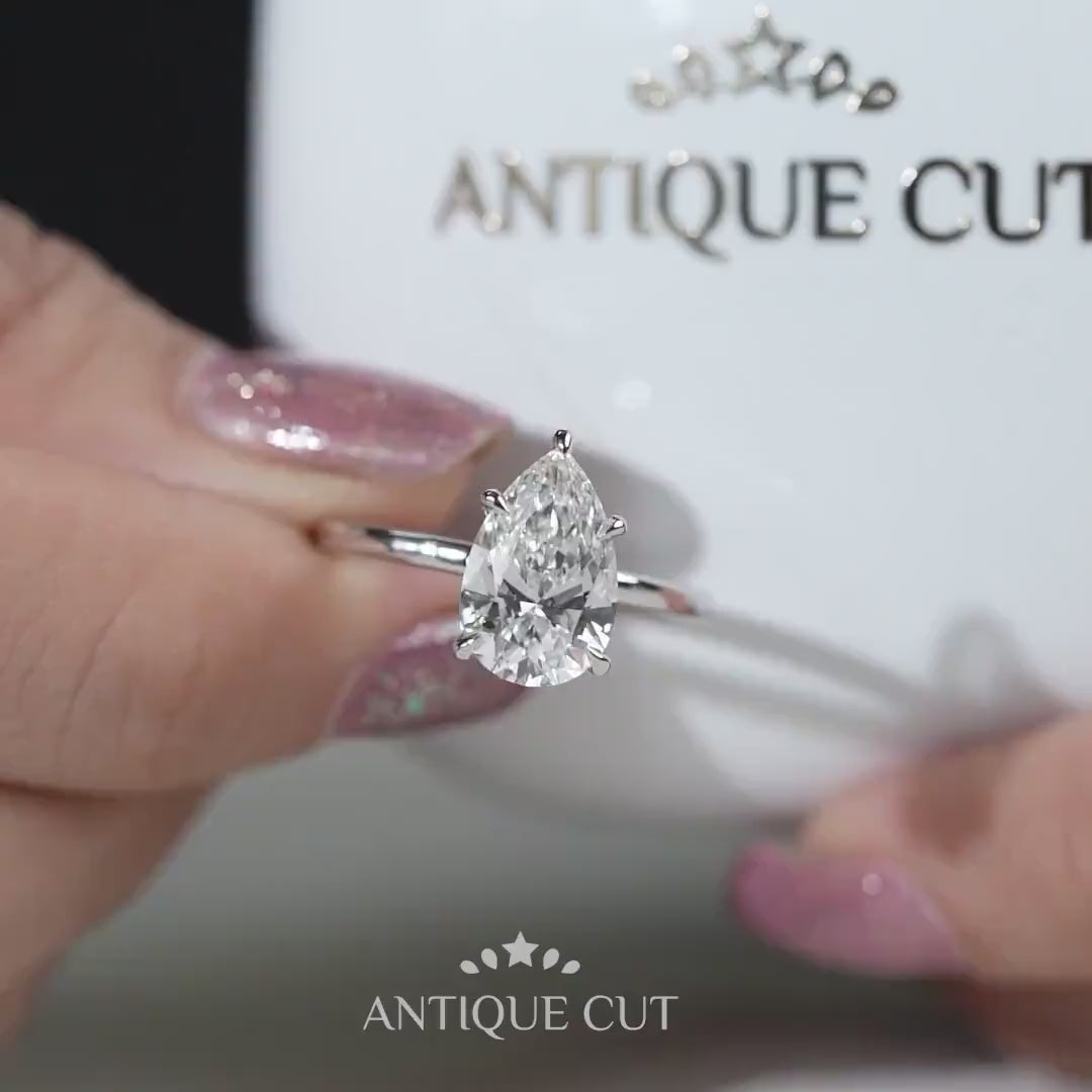 Pear diamond ring white gold