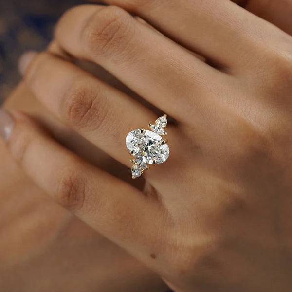 Oval diamond cathedral set engagement ring