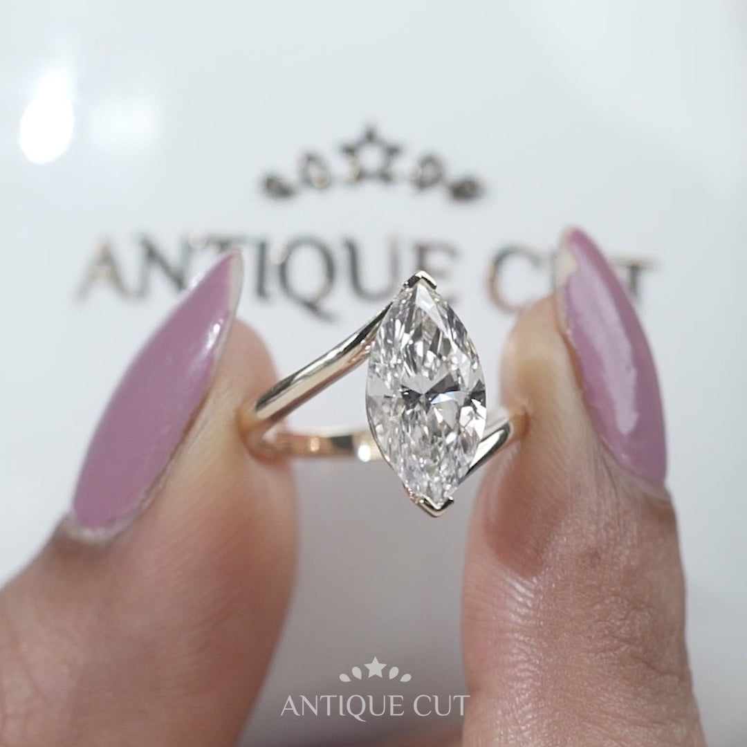 Yellow gold marquise solitaire diamond ring