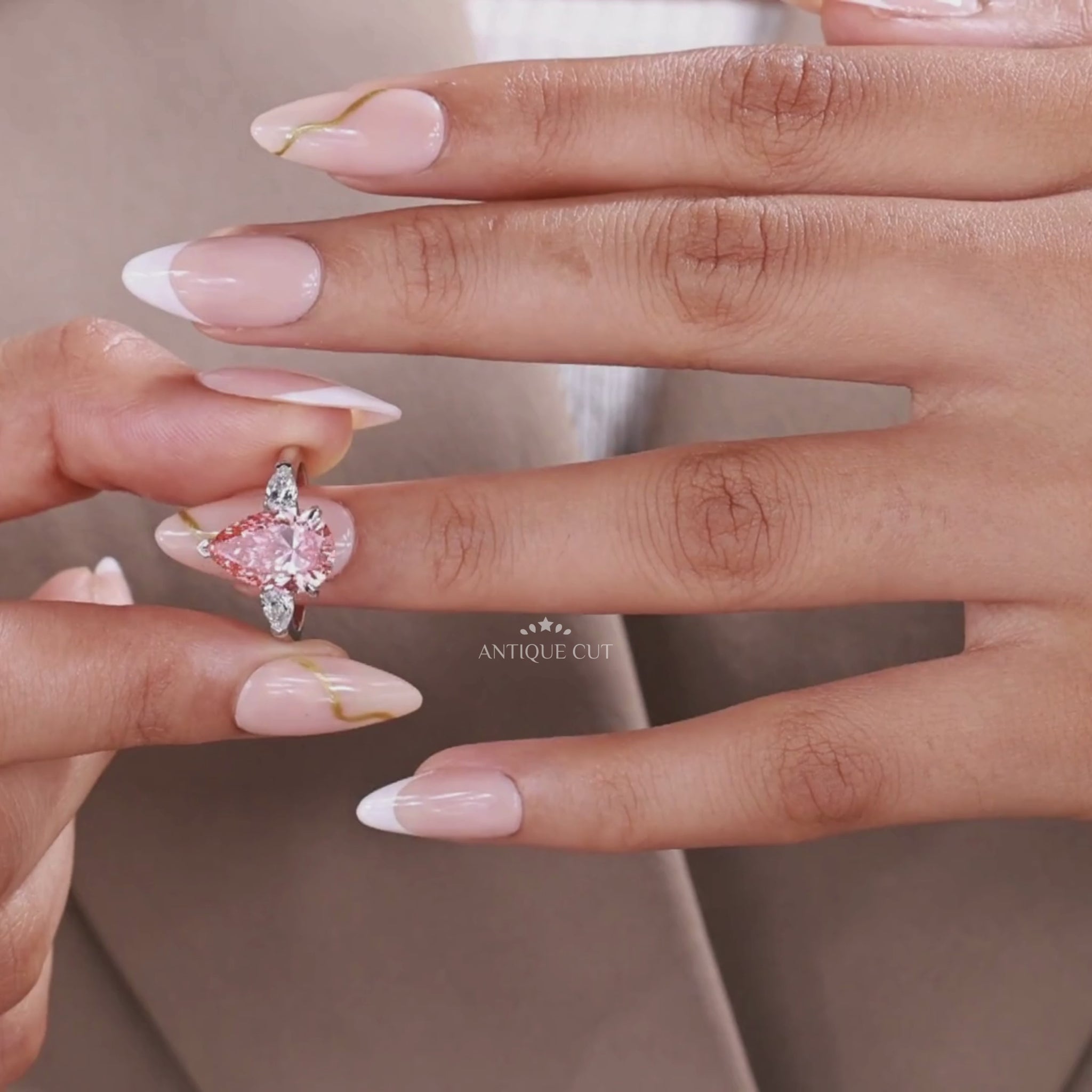 Pear shaped fancy pink lab grown diamond ring with IGI certified diamonds
