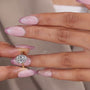 Oval solitaire engagement ring with accent stones