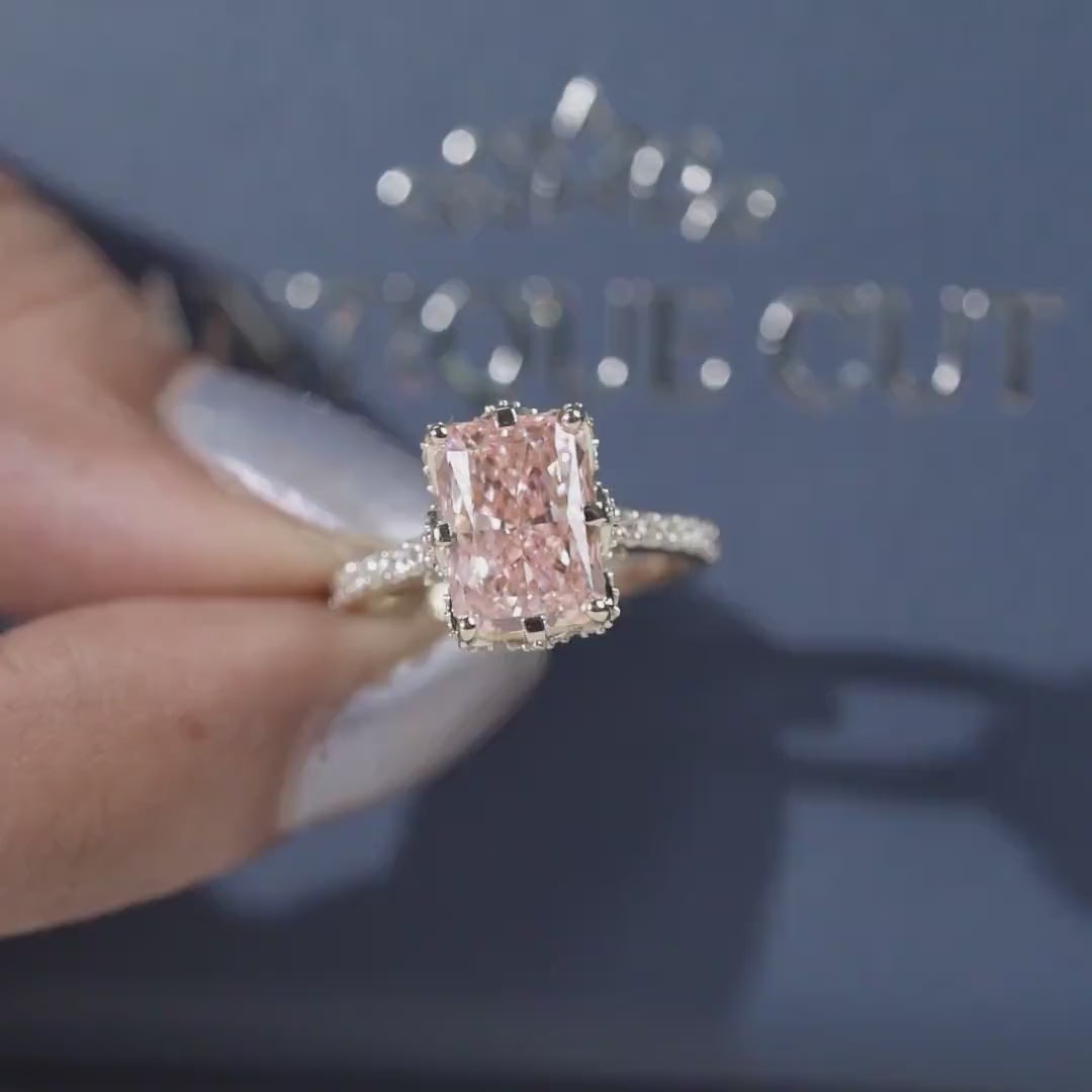Yellow gold radiant pink diamond ring with hidden halo