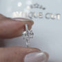 Oval cut diamond ring with pave band