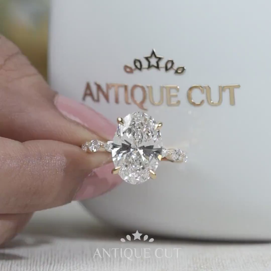 Oval Cut Diamond Engagement Ring with Hidden Halo & Marquise Side Stones