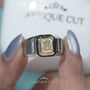 Modern yellow gold cushion cut engagement ring