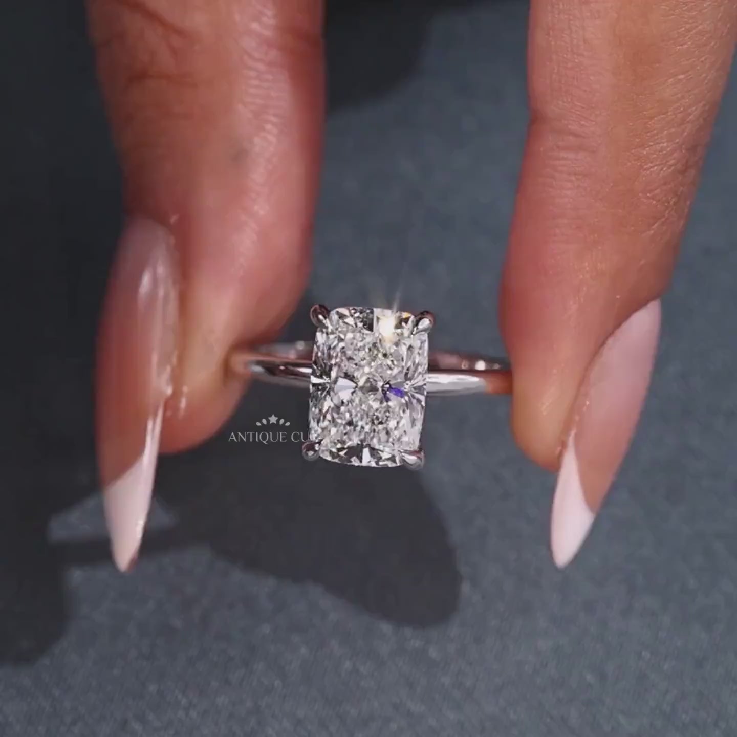 Lab grown cushion diamond ring with claw prong setting design
