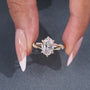 1.5 ct oval diamond engagement ring with vine design band