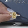 Yellow diamond ring with hidden halo and pave band
